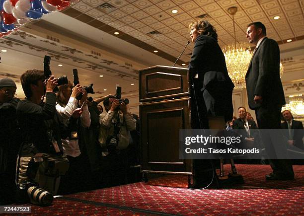 Tammy Duckworth concedes the Sixth District Congressional seat to Republican Peter Roskam as her husband Bryan Bowlsbey listens on November 7, 2006...