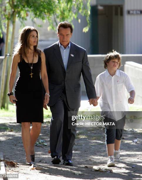 Brentwood, UNITED STATES: California Governor Arnold Schwarzenegger, his wife Maria Shriver and son Christopher leave a polling station during the US...