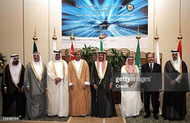 Abu Dhabi, UNITED ARAB EMIRATES: Oil ministers from the six countries of the Gulf Cooperation Council pose for a group picture during their talks in...