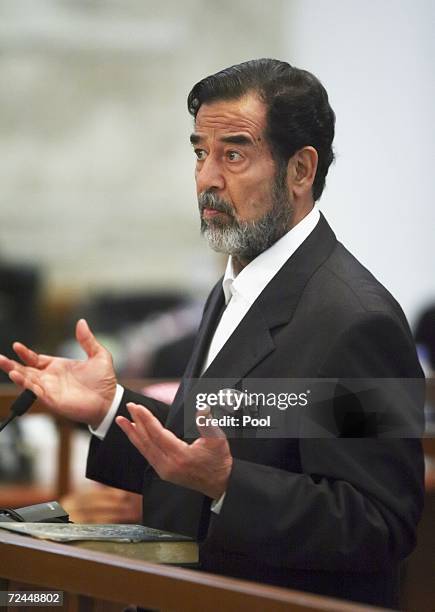 Saddam Hussein Back In Court For Genocide Hearing Photos and Premium Saddam Hussein Back In Court For Genocide Hearing Photos and Premium