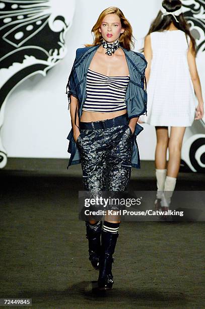 Model walks the runway at the Anna Sui Spring 2007 Fashion show during Olympus Fashion Week in the Tent in Bryant Park September 13, 2006 in New York...