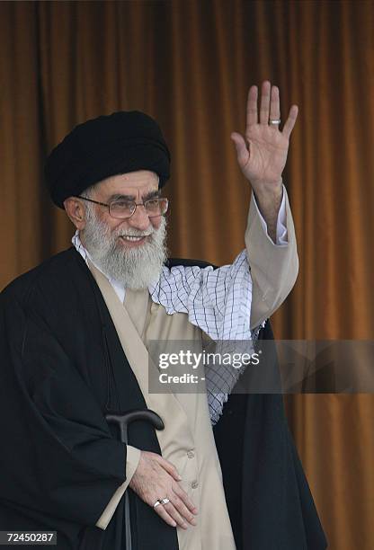 Iran's supreme leader Ayatollah Ali Khamenei waves to the crowd during a public meeting in the Iranian city of Semnan, some 220 Kms east of Tehran,...