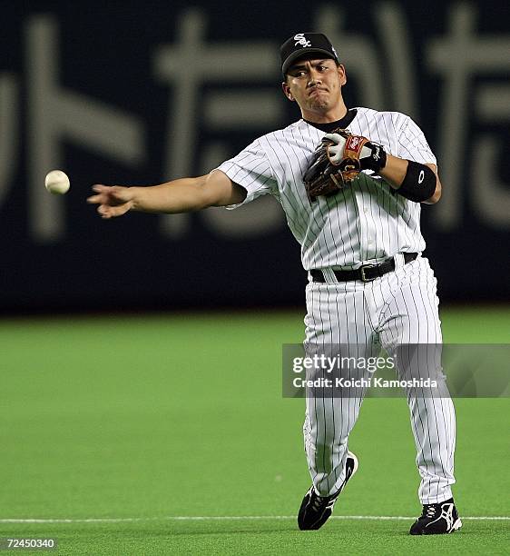 Tadahito Iguchi of the Chicago White Sox throws the ball during the Aeon All Star Series Day 5 - MLB v Japan All-Stars at Fukuoka Yahoo! Japan Dome...