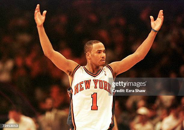 Chris Childs tries to get the crowd into the game after teammate Larry Johnson hit a three-point basket to give the Knicks a 88-85 over the Toronto...