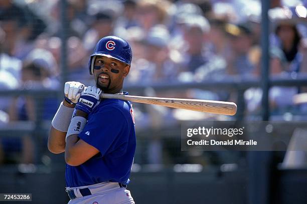 Willie Greene of the Chicago Cubs looks on while at bat during the Spring Training Game against the Oakland Athletics at the Phoenix Minicipal...