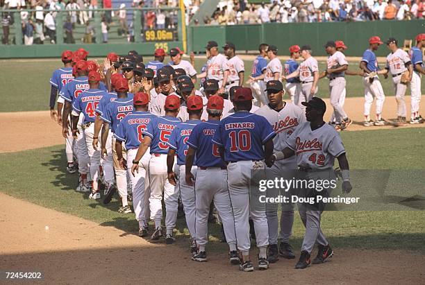 General view of the end of game congratulations on the field after the game between the Baltimore Orioles and the Cuban National Team at the Estadio...