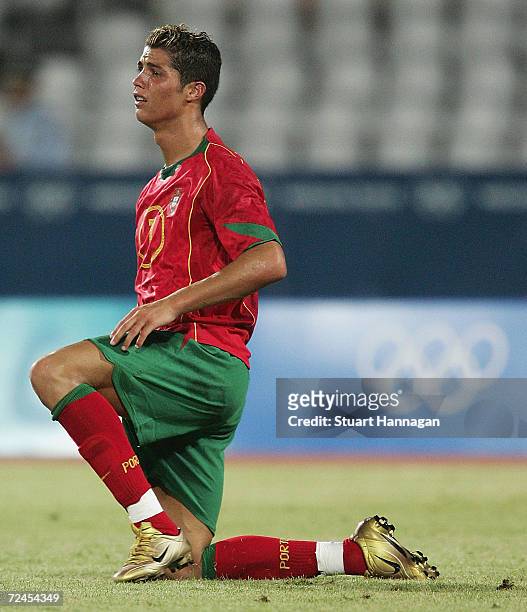 Cristiano Ronaldo of Portugal looks dejected after Iraq's 4-2 victory over Portugal in the men's football preliminary match between Iraq and Portugal...