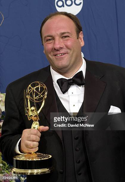 Actor James Gandolfini holds his award for Outstanding Lead Actor in a Drama Series backstage at the 52nd Annual Emmy Awards, September 10, 2000 in...