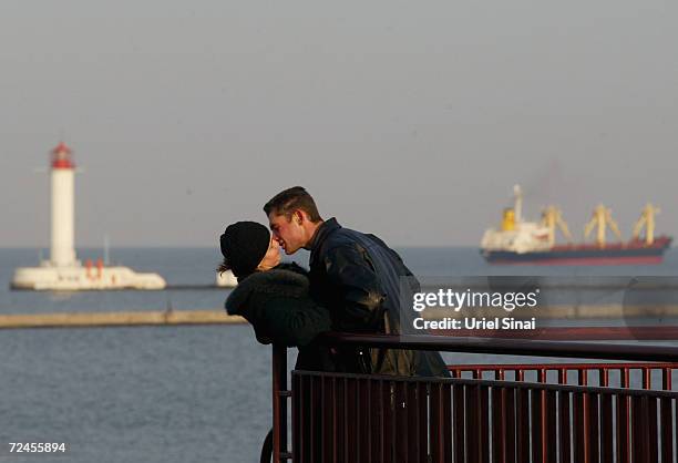 Couple share a romantic moment, December 8, 2004 overlooking the Ukranian port city of Odessa. Situated at the crossroads of several of the world's...