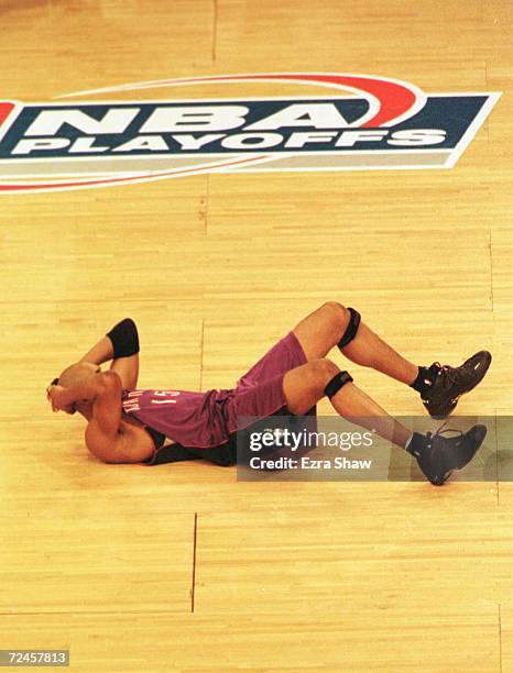 Vince Carter of the Toronto Raptors lies on the floor after losing to the New York Knicks 84-83 at Madison Square Garden in New York. The Knicks now...