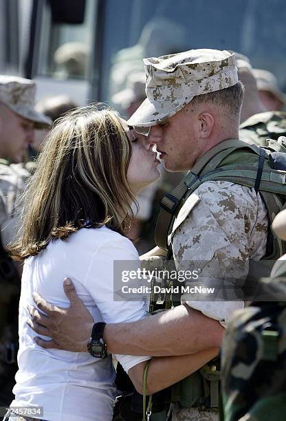 Couple kisses good-bye on September 11, 2004 at Camp Pendleton, California before the Third Battalion, 5th Marine Regiment departs in support of the...