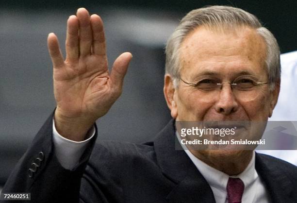 Secretary of Defense Donald Rumsfeld waves from outside the White House November 8, 2006 in Washington, DC. Former CIA director Robert Gates was...