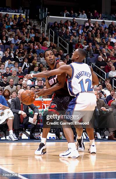 Rod Strickland of the Miami Heat looks to pass against Chris Whitney during their game at MCI Center in Washington, D.C.. The Heat won 97-95....