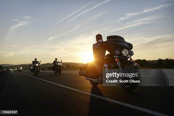 Bikers ride during the annual Sturgis Motorcycle Rally August 5, 2003 on the outskirts of Sturgis, South Dakota. The weeklong event is expected to...