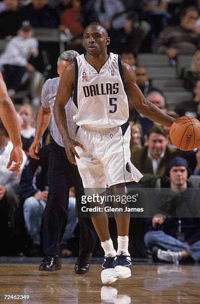 Point guard Avery Johnson of the Dallas Mavericks dribbles the ball during the NBA game against the Memphis Grizzlies at the American Airlines Center...