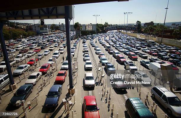 Thousands of cars line up to enter the United States from Mexico at the San Ysidro Port of Entry February 20, 2003 in San Ysidro, California. The San...