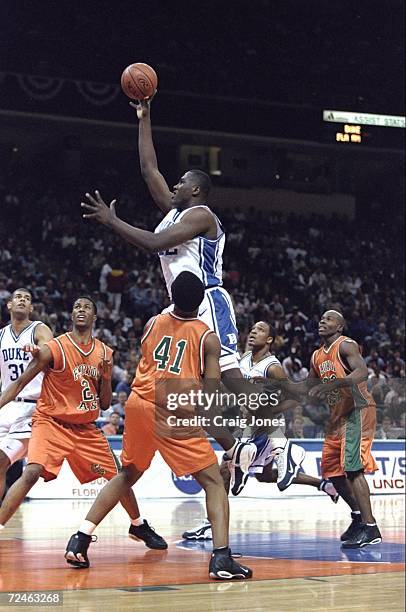 Elton Brand of the Duke Blue Devils in action during the NCAA First Round game against the Florida A&M Rattlers at the Charlotte Coliseum in...