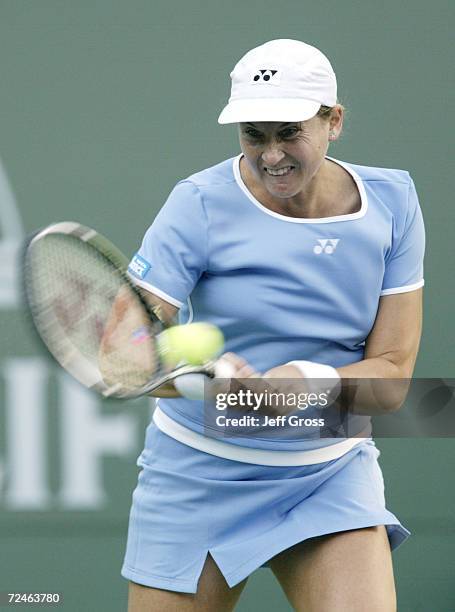 Monica Seles hits a backhand to Martina Sucha of Slovakia during the Pacific Life Open at the Indian Wells Tennis Garden in Indian Wells, California....