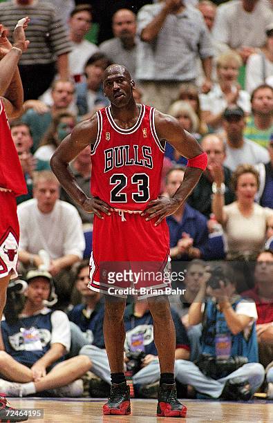 Michael Jordan of the Chicago Bulls stands on the court during game five of the NBA Finals against the Utah Jazz at the Delta Center in Salt Lake...