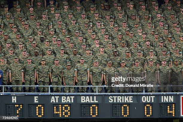 Marines sing from the stands during the Interleague MLB game between the San Diego Padres and the Minnesota Twins at Qualcomm Stadium on June 8, 2003...