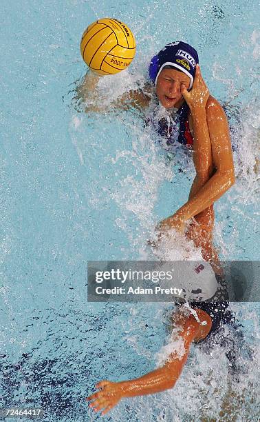 Natalia Shepalina of Russia has her eye gouged by Thalia Munro of the USA in a women's Water Polo preliminary game August 20, 2004 during the Athens...