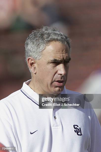 Head coach Paul Pasqualoni of the Syracuse Orangemen stands on the field before the Big East Conference football game against the Miami Hurricanes at...