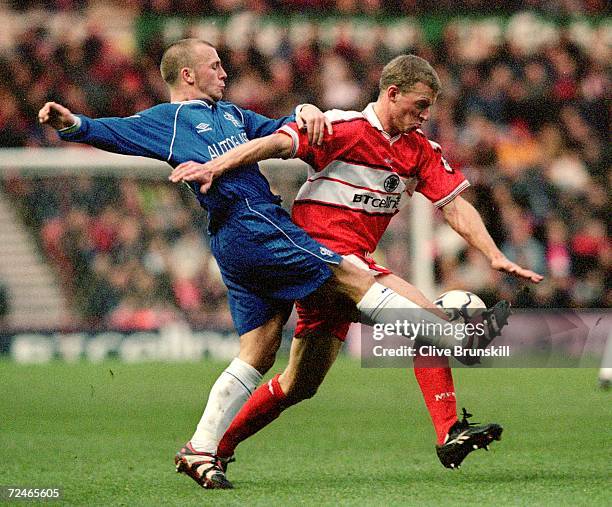 Jody Morris of Chelsea challenges Robbie Mustoe of Middlesbrough during the FA Carling Premiership game at the Riverside Stadium in Middlesbrough,...