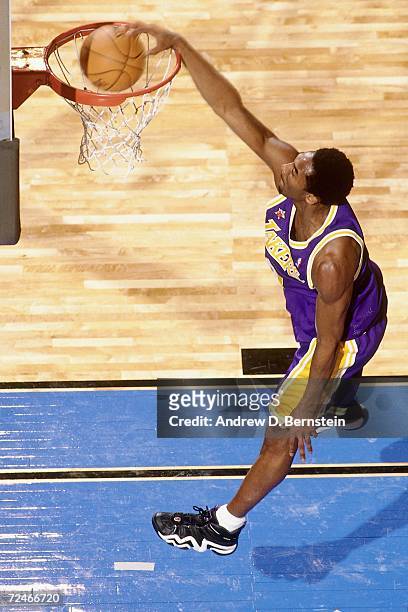 Kobe Bryant of the Western Conference All-Stars dunks against the Eastern Conference All-Stars during the 1998 NBA All-Star game played February 14,...
