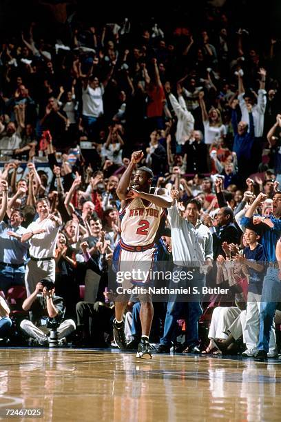 Larry Johnson of the New York Knicks celebrates after he hit a three-point basket against the Indiana Pacers in game four of the Eastern Conference...