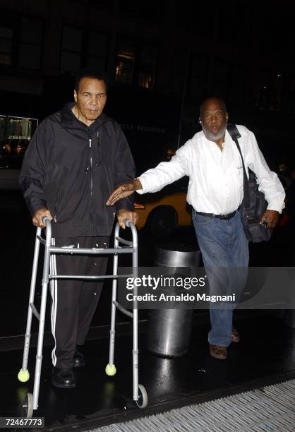 Muhammad Ali and longtime friend and photographer Howard Bingham arrive at their midtown hotel November 8, 2006 in New York City.