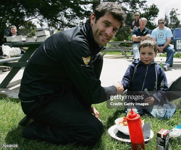 Mark Webber takes time out to meet young Daniel who has had liver cancer, during day five of the Mark Webber Pure Tasmania Challenge on November 9,...