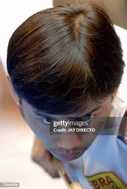 Lee van Corteza of the Philippines lines up a shot during the sixth day round match against David Alcaide of Spain, at the World Pool Championship...