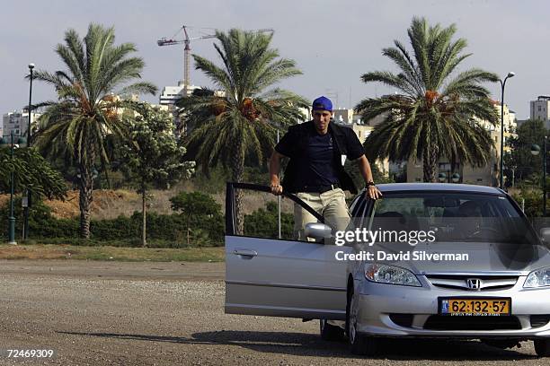 Francisco Gonzalez, a Spanish trainee at the International Security Academy , practices jumping in and out of a moving car during a training exercise...