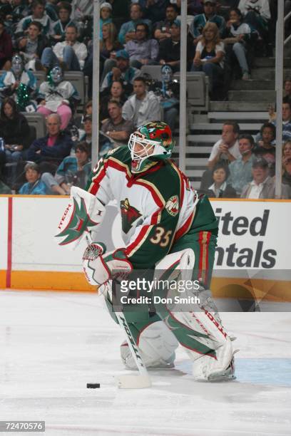 Manny Fernandez of the Minnesota Wild clears the puck during a game against the San Jose Sharks on October 21, 2006 at the HP Pavilion in San Jose,...