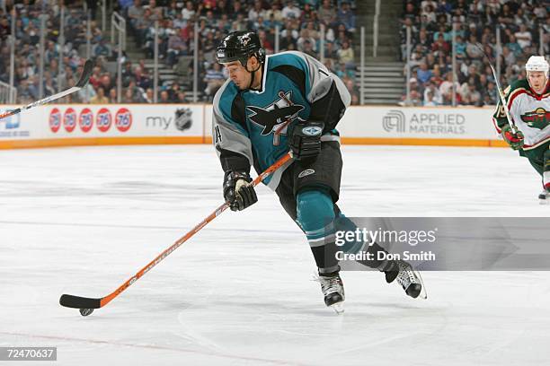 Jonathan Cheechoo of the San Jose Sharks skates with the puck during a game against the Minnesota Wild on October 21, 2006 at the HP Pavilion in San...