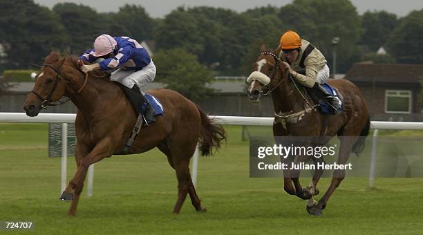 June 14: Jimmy Fortune and Carlton lead the Richard Hughes ridden Sharp Hat home to land The Jolly Good Day Out Claiming Stakes run at Sandown...