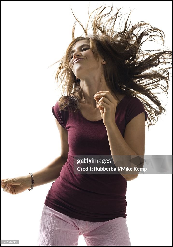 Close-up of a young woman dancing