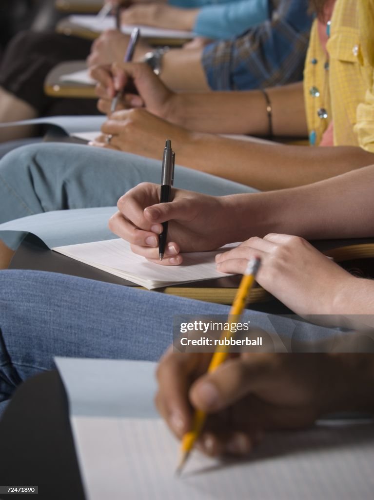 College Students Writing And Taking Notes High-Res Stock Photo - Getty ...