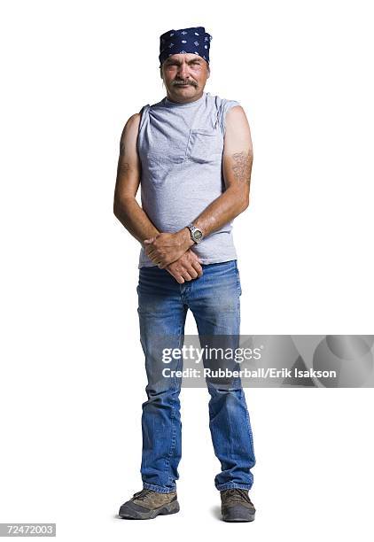 disheveled middle aged man with head scarf - hillbilly stock pictures, royalty-free photos & images