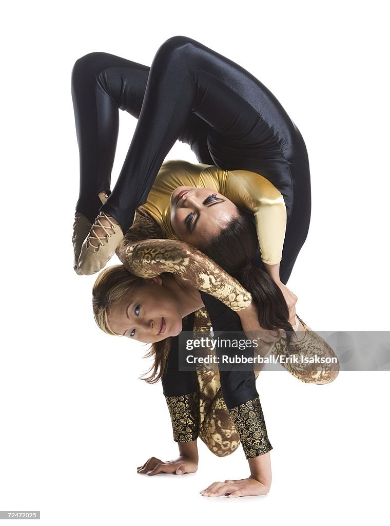 Female Contortionist Duo Performing Stock-Foto - Getty Images