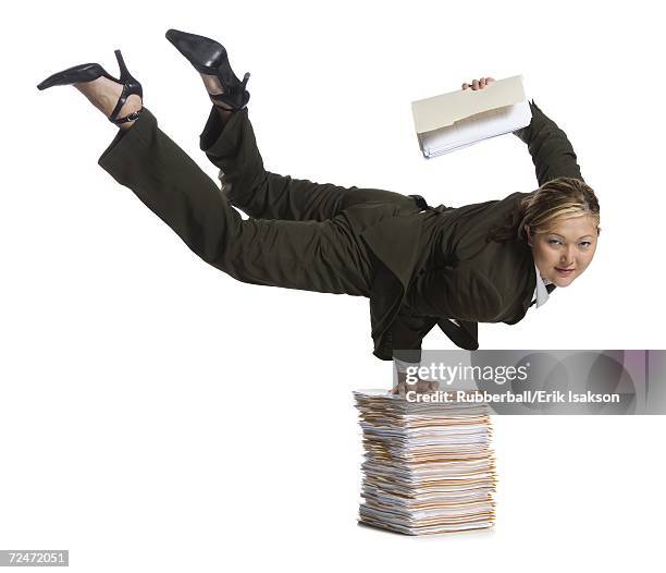 female contortionist businesswoman - businesswoman handstand stock pictures, royalty-free photos & images