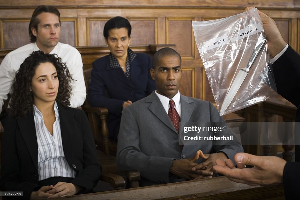 Lawyer presenting evidence to jurors