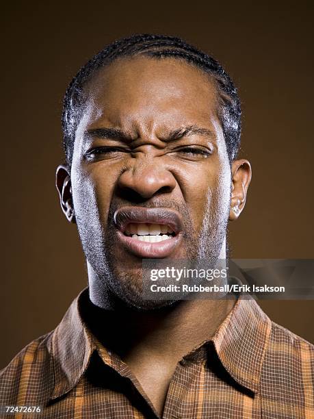 african american scowling - grimacing stock pictures, royalty-free photos & images