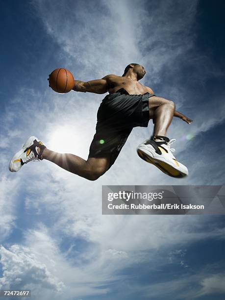 basketball player - slam dunk stock pictures, royalty-free photos & images