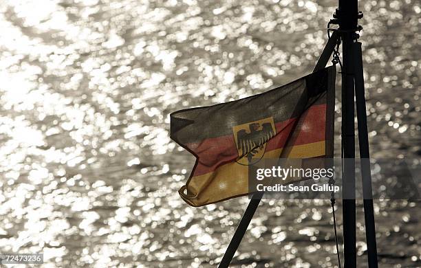 German flag on a minesweeper of the German Navy blows in the wind as the ship stands in port November 9, 2006 in Kiel, Germany. The German Navy is...