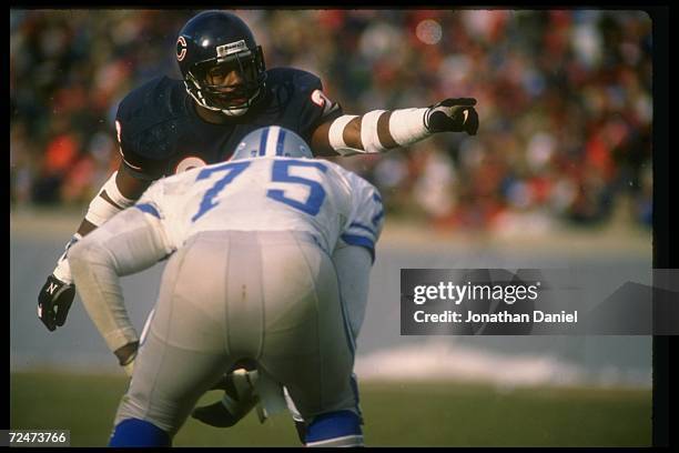 Defensive back Dave Duerson of the Chicago Bears works against the Detroit Lions during a game at Soldier Field in Chicago, Illinois.