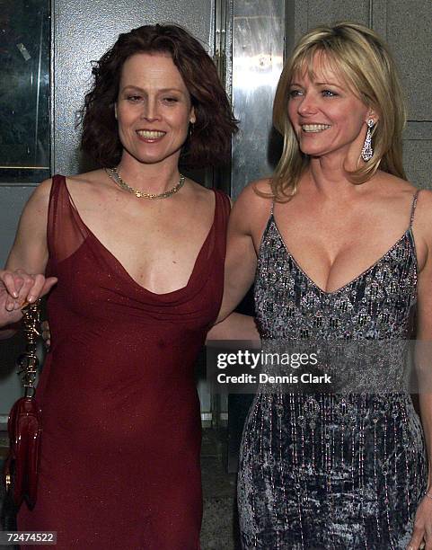 Actress Cheryl Tiegs and Sigourney Weaver arrives at the Michael Awards March 11, 2002 at the Hammerstien Ballroom in New York City.