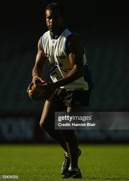 Byron Pickett runs a drill, during Kangaroos training at Colonial Stadium, Melbourne, Australia. DIGITAL IMAGE. Mandatory Credit: Hamish Blair/Getty...