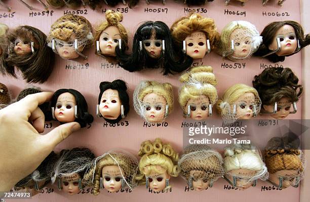 Handmade doll heads are seen on display at The Alexander Doll Company November 17, 2004 in New York City. The company was founded in 1923 and opened...