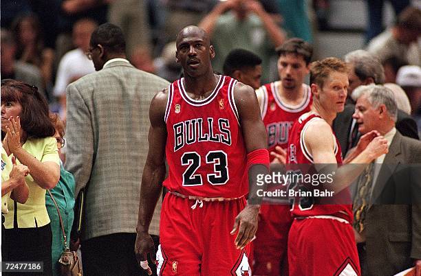 Michael Jordan of the Chicago Bulls walks on the court during game five of the NBA Finals against the Utah Jazz at the Delta Center in Salt Lake...
